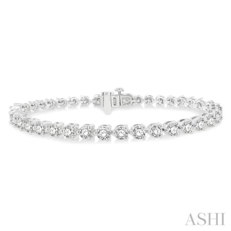 7 ctw Tri-Prong Round Cut Diamond Bracelet in 14K White Gold