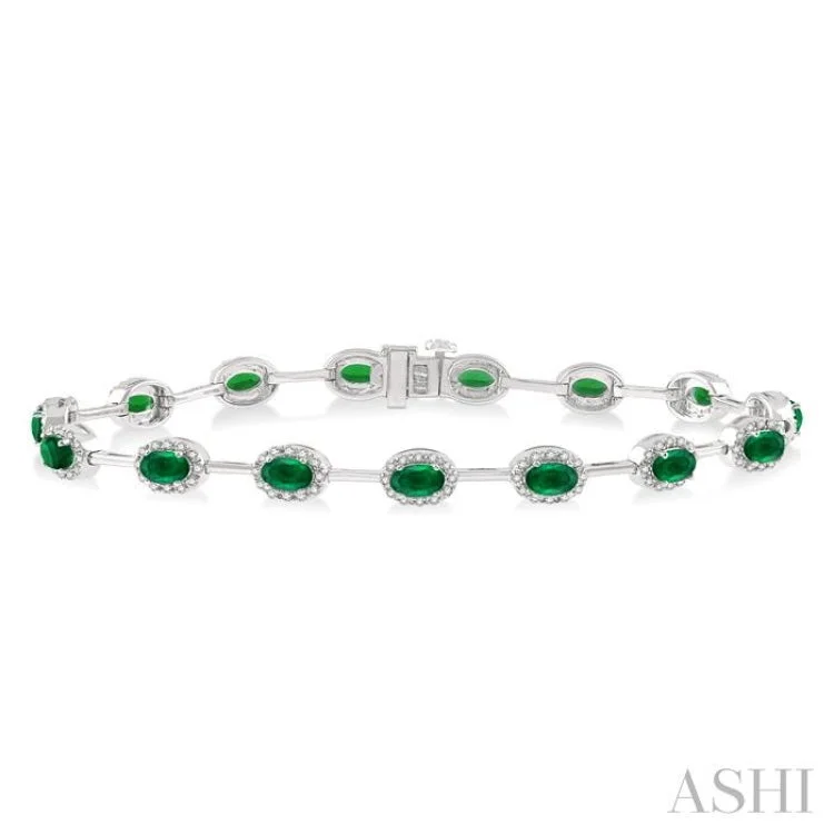 5/8 ctw Round Cut Diamond & 5x3MM Oval Cut Emerald Precious Bracelet in 14K White Gold