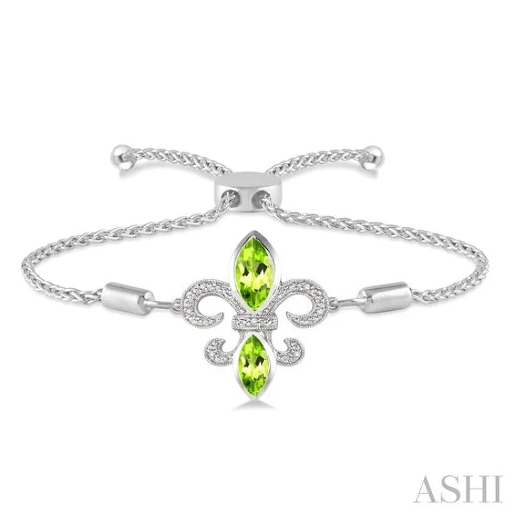 1/20 Ctw Round Diamond and Marquise 10x5mm & 8x4mm Peridot Fleur De Lis Sterling Silver Lariat Bracelet